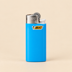 BIC LIGHTERS MINI - 50CT — representative studio product mockup on beige