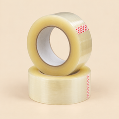 2' X 110 YARD X 1.8 MIL (ADHESIVE TAPE) - TOUCH PRINTED - 54CT — illustrative studio photo on beige