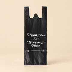 6.5 X 4.5 500ct BLACK THANK YOU LIQUOR BAG — beige studio product photo