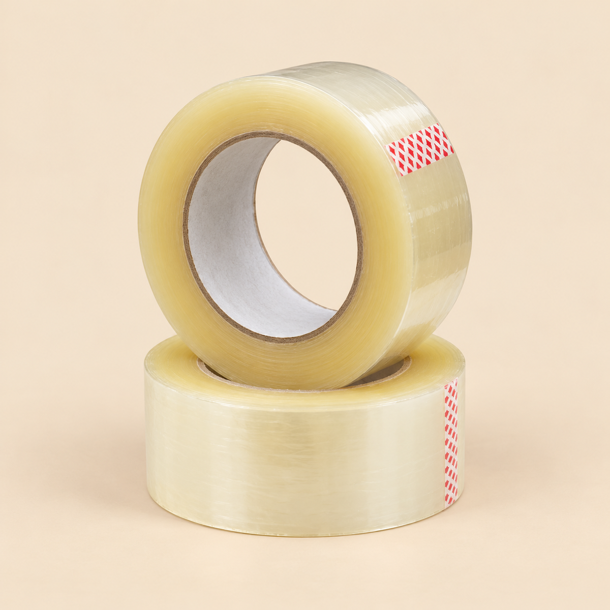 2' X 110 YARD X 1.8 MIL (ADHESIVE TAPE) - TOUCH PRINTED - 54CT — illustrative studio photo on beige