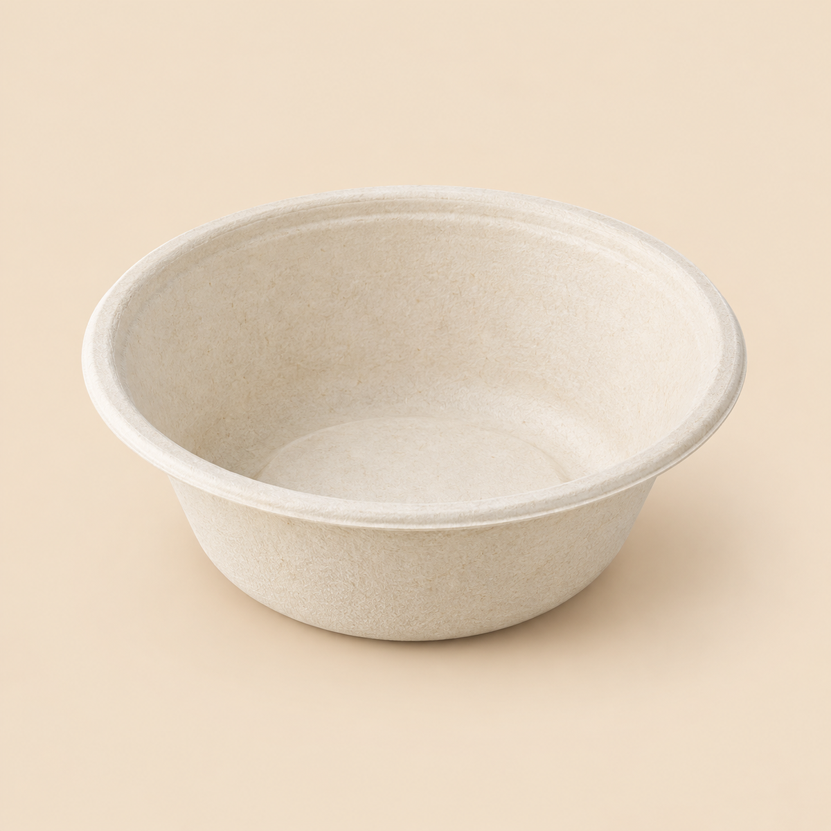 Illustrative product mockup: one empty unbranded 12-fluid-ounce disposable biodegradable molded-fiber round bowl, off-white natural bagasse texture, moderately deep bowl with flared sides and circular rim; no lid