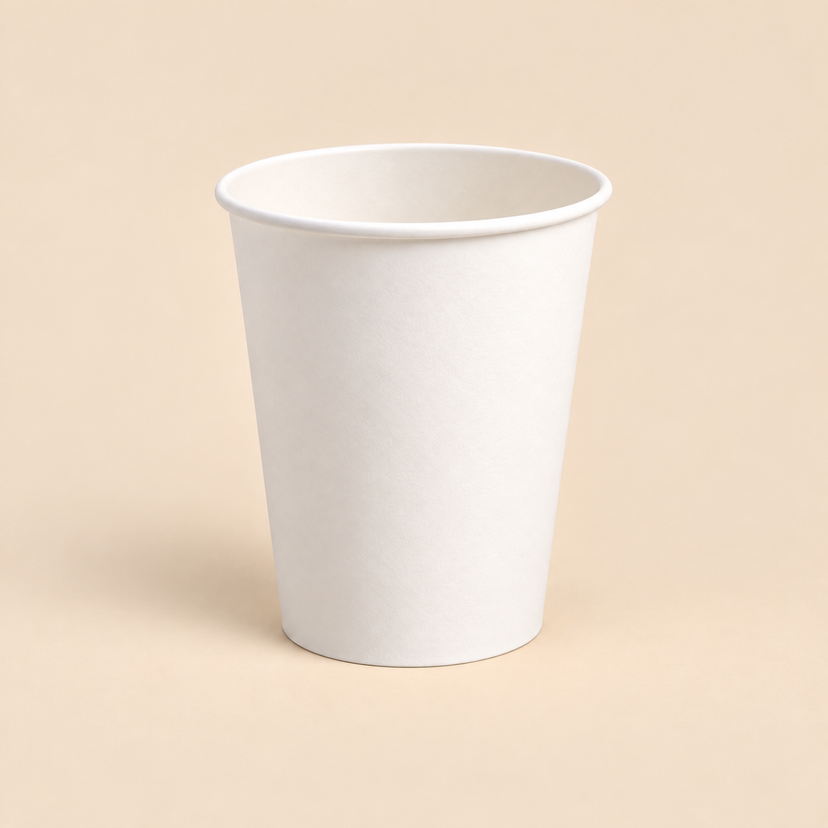 12oz WHITE COFFEE CUPS - 1000CT — illustrative mockup on beige background