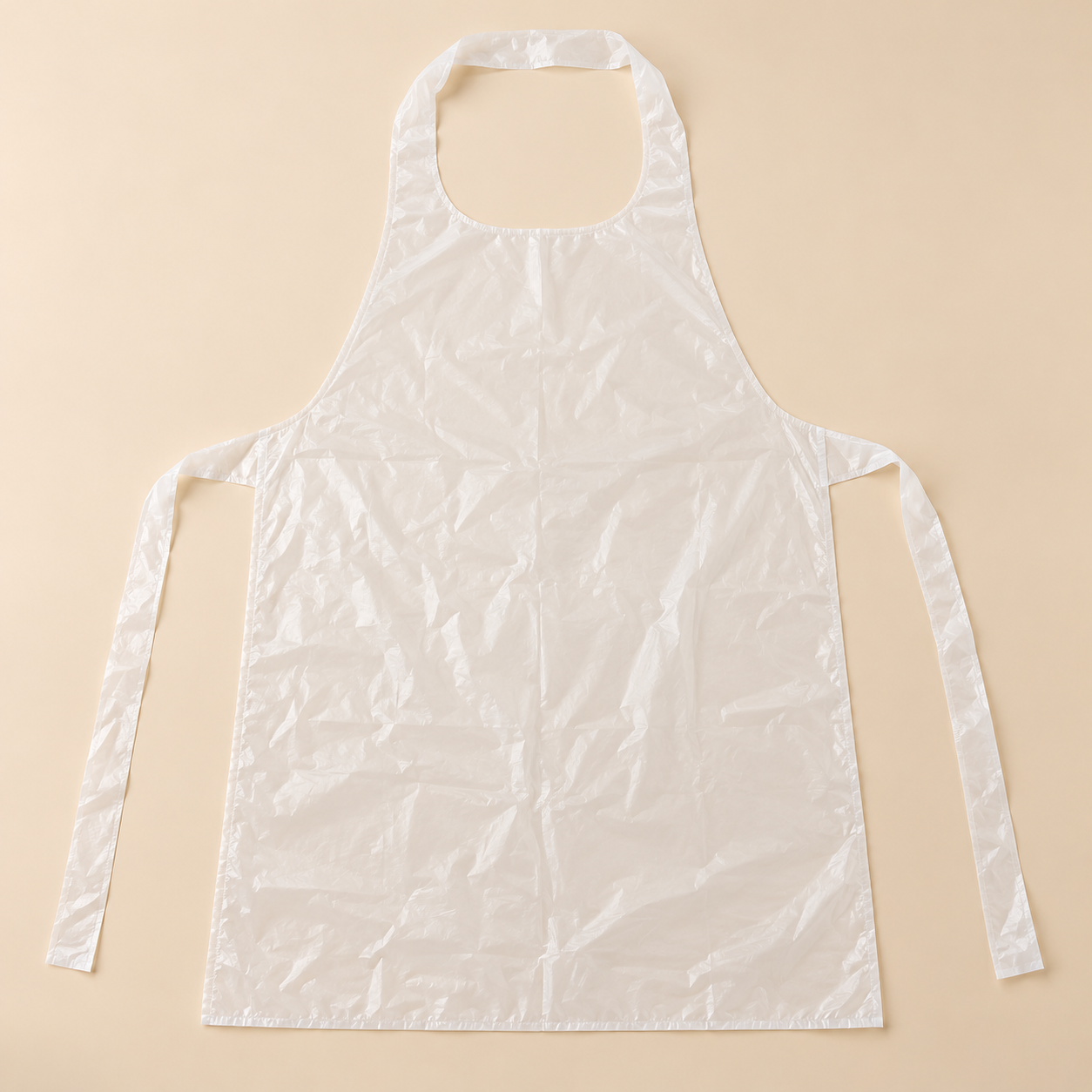 DISPOSABLE POLY APRONS HD - 28' X 46' 1 MIL- 100ct — beige studio product photo