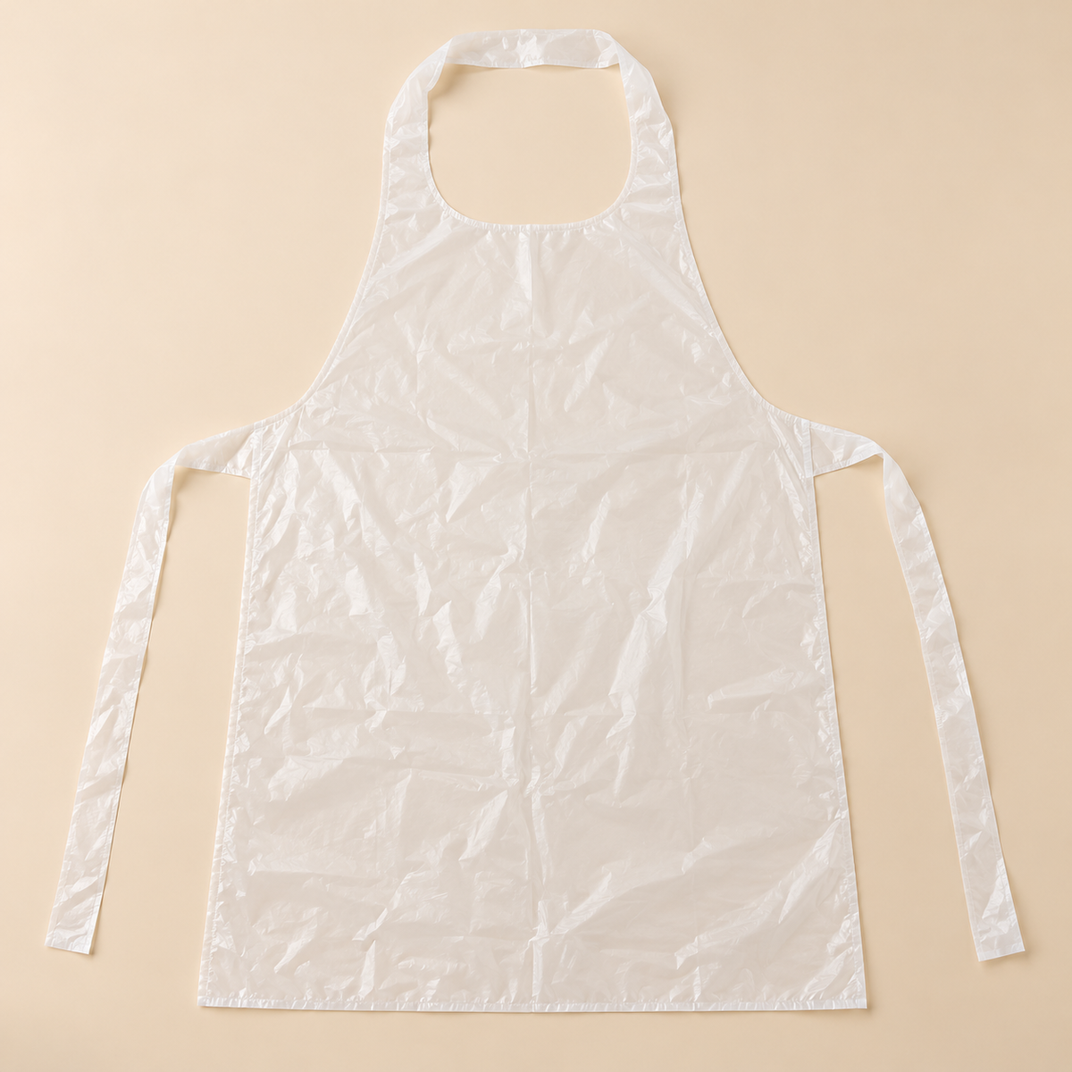 DISPOSABLE POLY APRONS HD - 28' X 46' 1 MIL- 100ct — beige studio product photo